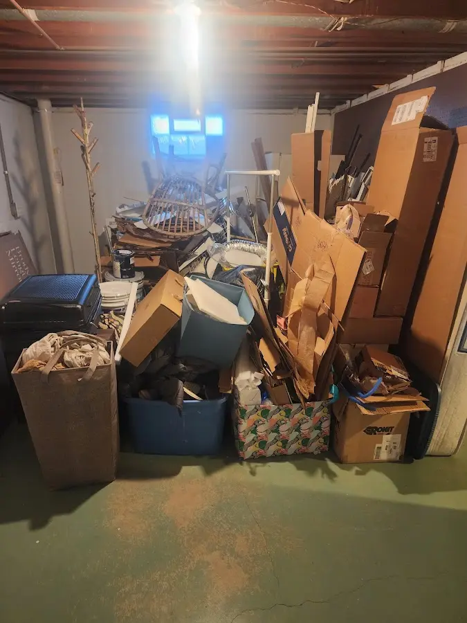 Roll-off dumpster container at job site for 4 Yard Dumpster Rental in Warren